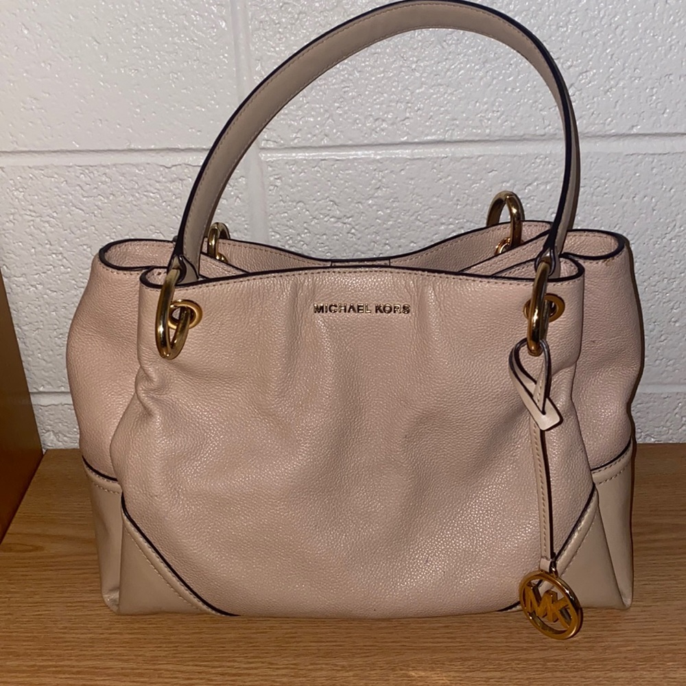 Light pink Michael Kors purse lightly used
